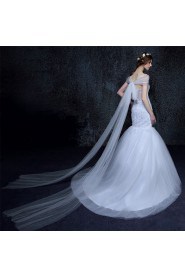 Trumpet / Mermaid Off-the-shoulder Tulle Wedding Dress